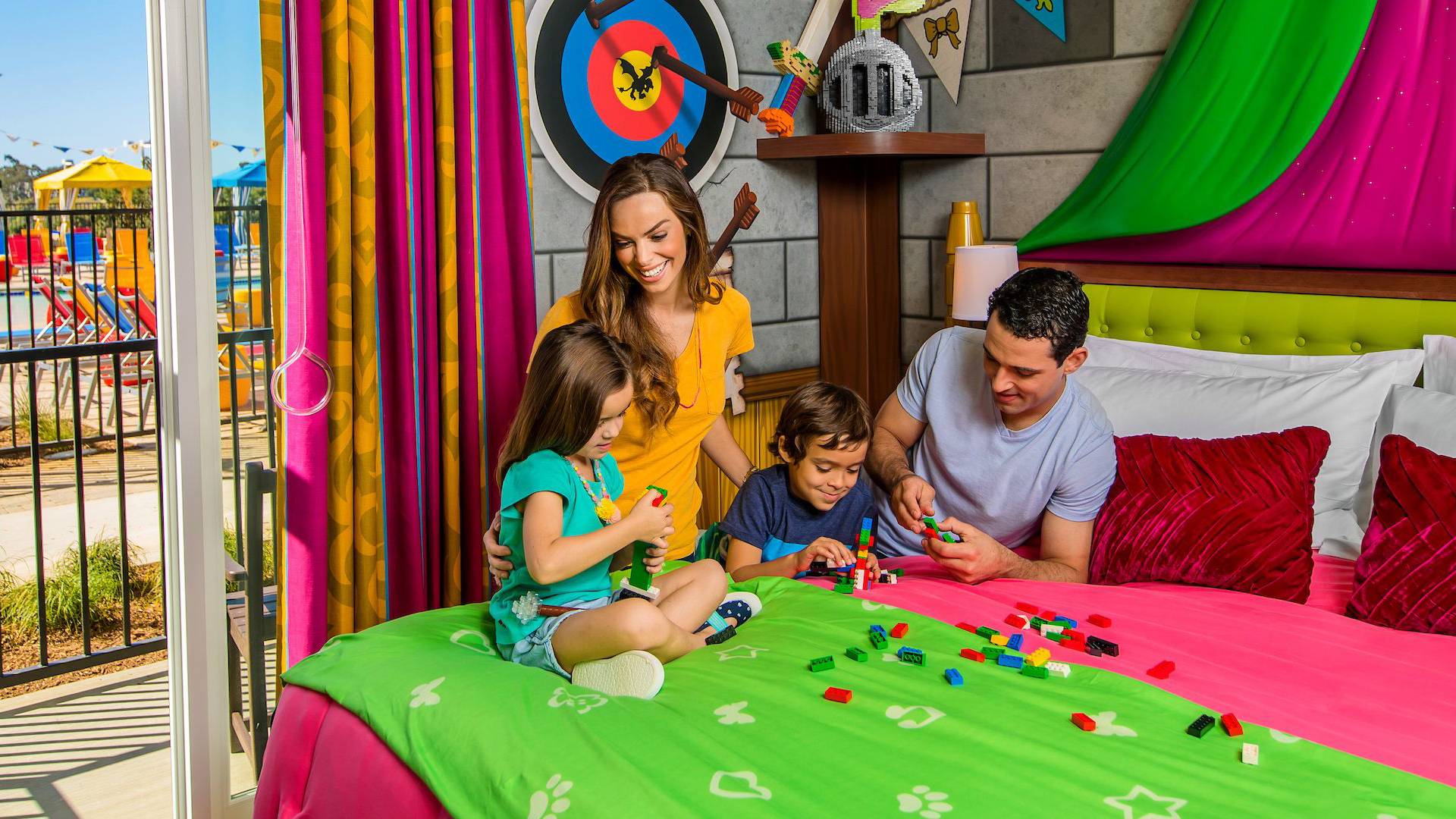 Family Plays with LEGO in a Princess Themed Patio Room