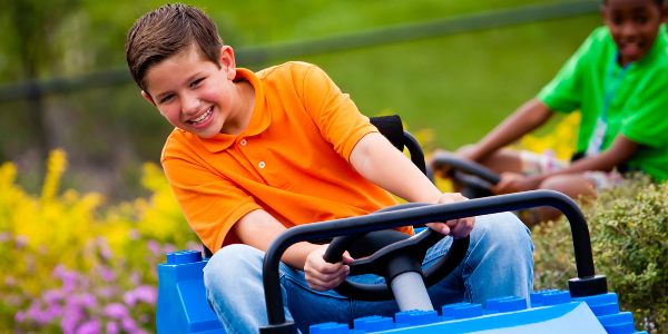 Kid driving car at Driving School